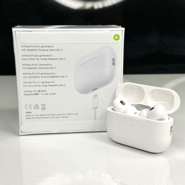 Smartwatch and AirPods Pro 2 combo with orange band - lifestyle view