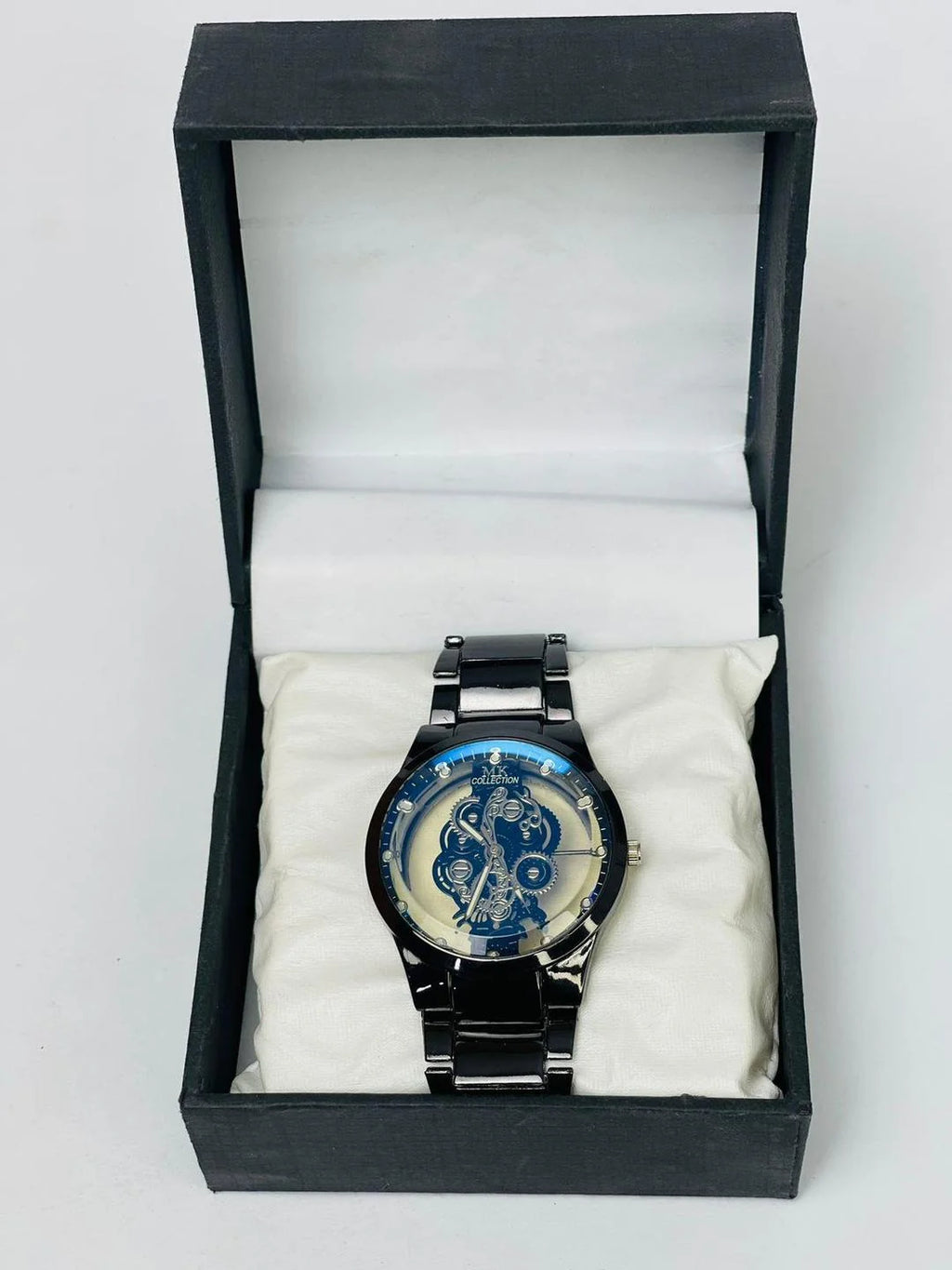 Men's skeleton wrist watch with steel bracelet – side view