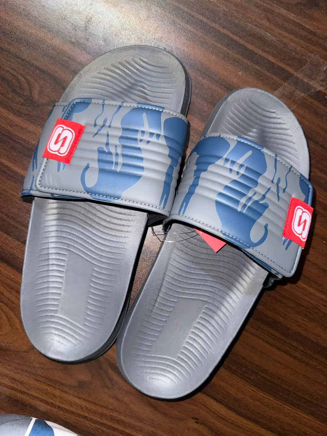 Camo slide slippers lightweight sole detail
