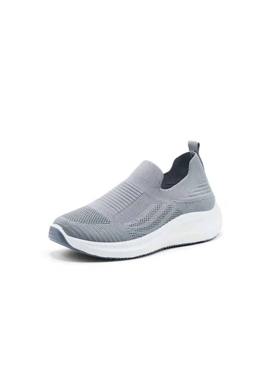 Grey canvas slip-on sneakers side view