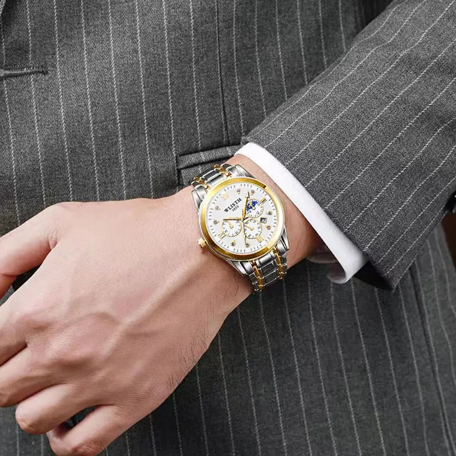 Gold tone steel watch luminous dial – close-up
